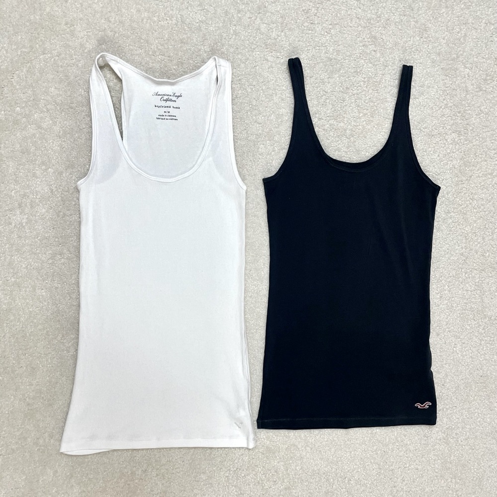 AEO white M & Hollister black L cami tank tops.